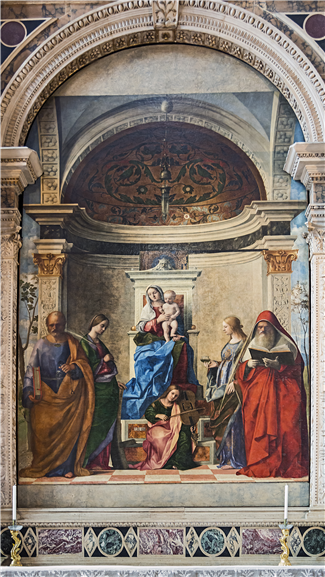 조반니 벨리니, 산 자카리아 제대화, 1505년, 산 자카리아.  성당 성모와 아기 예수가 중앙에 자리하고 그 양옆으로 성인들이 서 있다. 각자 생각에 잠겨 있으나 영적인 소통이 이루어지는 듯해 이런 형식의 그림을 ‘성스러운 대화’, 이탈리아어로 ‘사크라 콘베르사치오네Sacra Conversazione’라고 부른다. 이런 구성의 그림은 베네치아에서 특히 유행한다.
