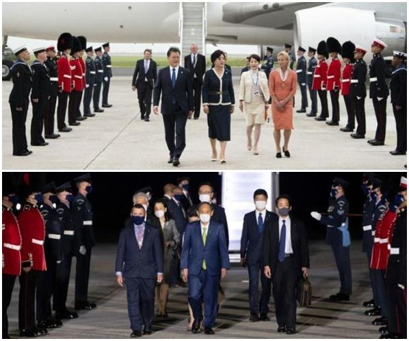 문재인 대통령이 11일(현지시간) 주요 7개국(G7) 정상회의 참석차 영국에 입국한 모습으로, 마스크를 벗은 채 의장대 사열을 받으며 들어오고 있다(위 사진). 반면 스가 일본 총리는 마스크를 쓴 채 입국했다. 온라인 커뮤니티