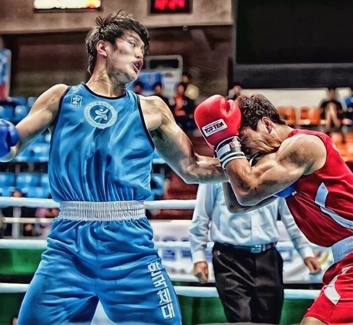 이계현 관장 체전에서 양희근과 경기장면모습(좌측)